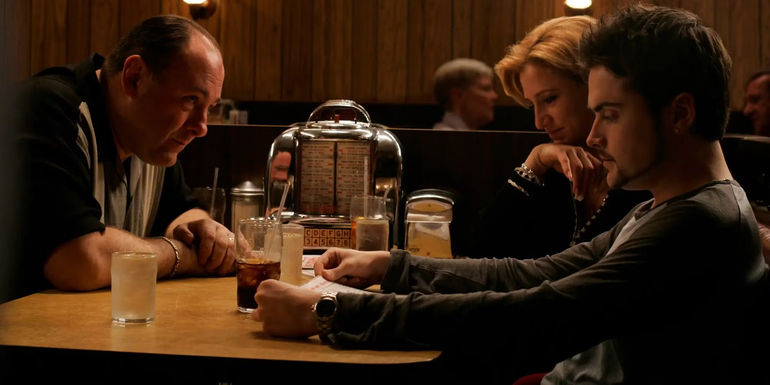 Tony, Carmela, and AJ in a restaurant in The Sopranos