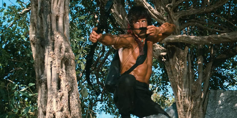 Rambo aims a bow in First Blood Part II