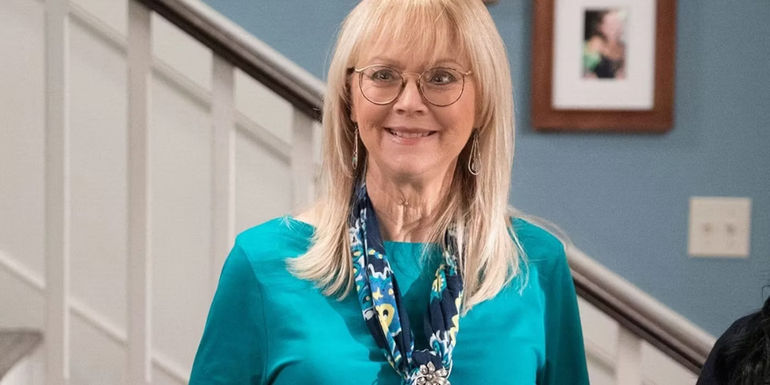 Dede Pritchett (Shelly Long) smiling in a slightly confused manner on Modern Family