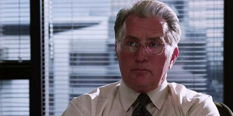 Queenan in his office in The Departed