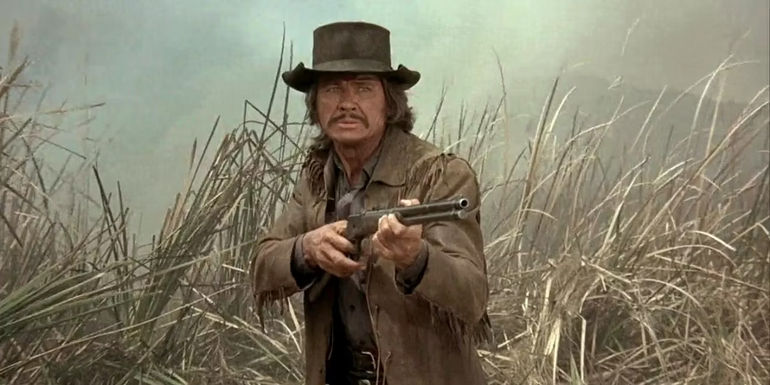 Link pointing a gun in Red Sun