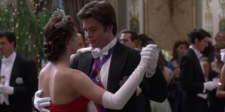Mia (Anne Hathaway) dancing with Nicholas (Chris Pine) at the ball in The Princess Diaries 2.