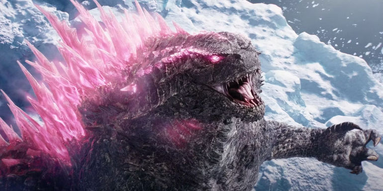 Godzilla with his spikes glowing pink emerges from the ice in Godzilla x Kong: The New Empire