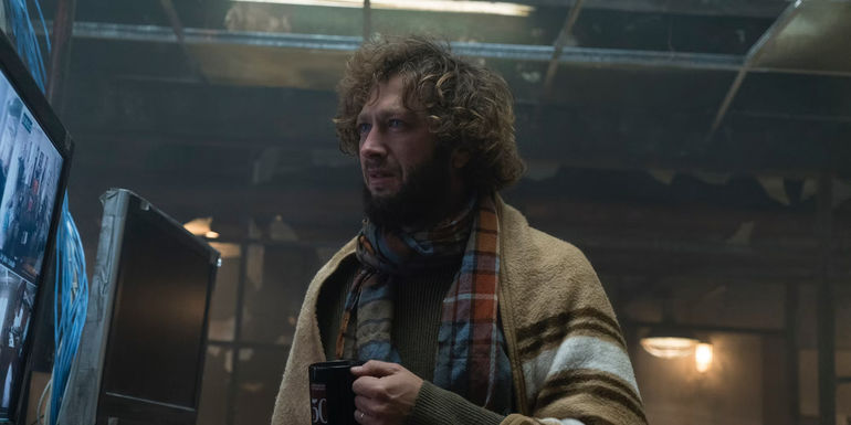 Ebon Moss-Bachrach viewing a surveillance monitor in Marvel's The Punisher Netflix