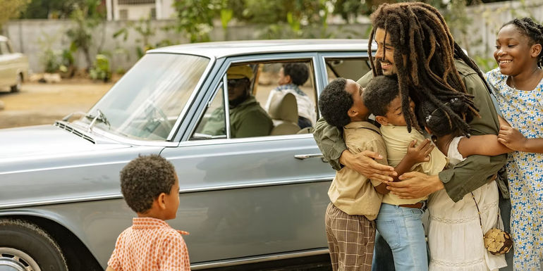 Bob Marley hugs his kids in Bob Marley One Love