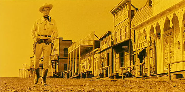 Lemonade Joe walks through the town in Lemonade Joe 1964