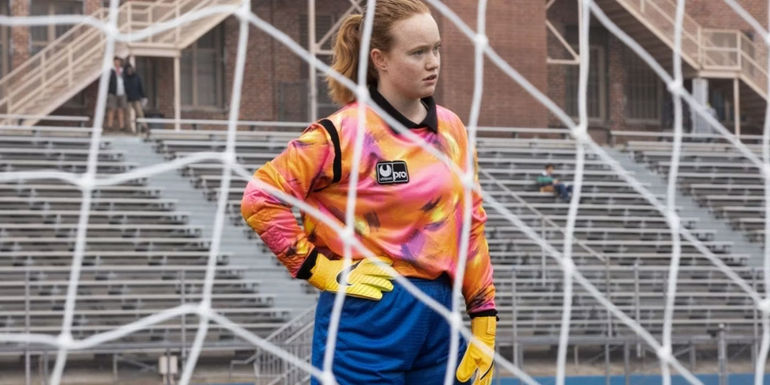 Van in front of a goalpost in Yellowjackets