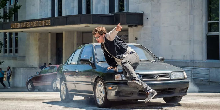 Baby jumping over a car in Baby Driver