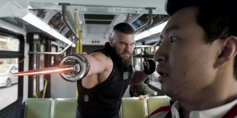 Razor Fist fights Shang-Chi on a bus in Shang-Chi and the Legend of the 10 Rings