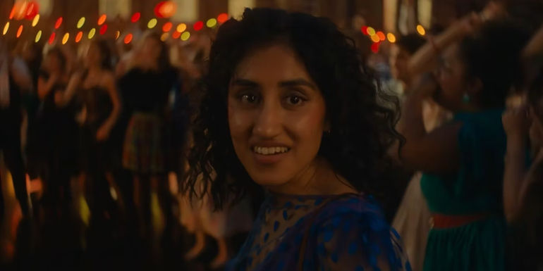 Emma smiling at Dexter. 