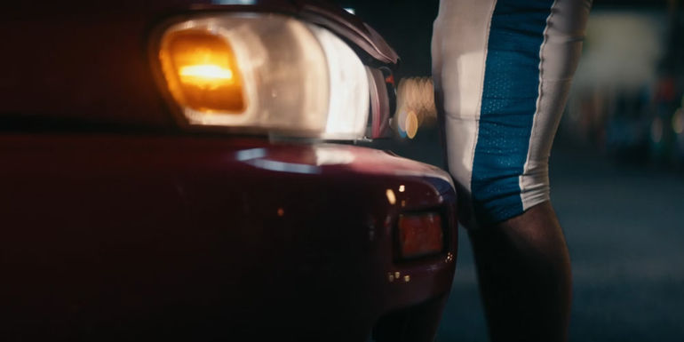 The car touching Jeff's leg in Bottoms