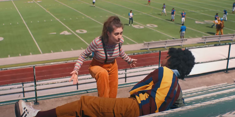 PJ talks to Josie while on the bleachers in Bottoms