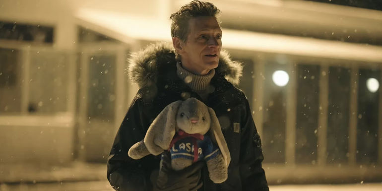 John Hawkes' Captain Hank Prior waiting for his fiance at the airport in True Detective Night Country