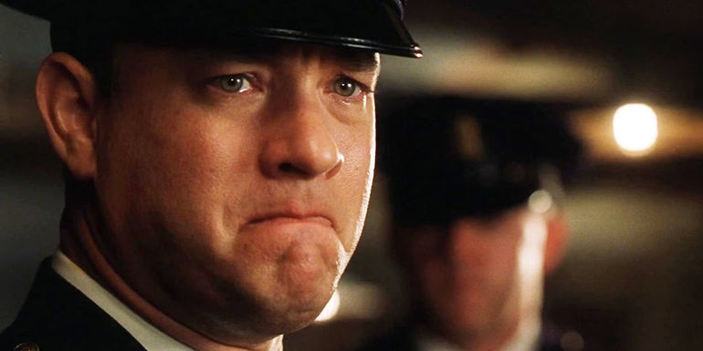 Tom Hanks holds back tears in The Emerald Path.