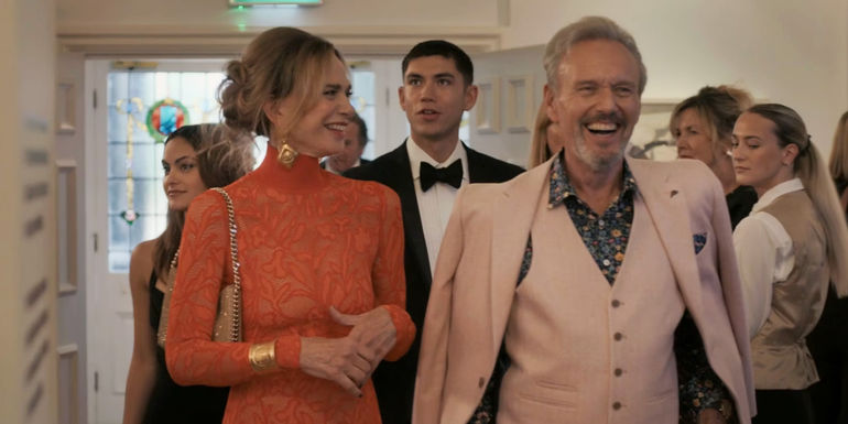 Catherine and Julian laughing in Upgraded