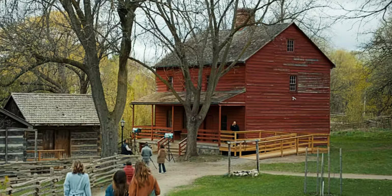 People walk to the John Carver House in Thanksgiving