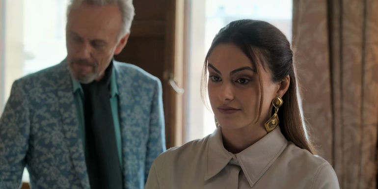 Julian standing behind Ana in Upgraded