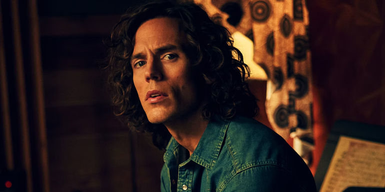 Sam Claflin with long hair in Daisy Jones