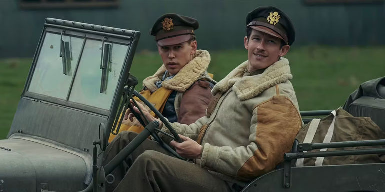 Callum Turner as John Bucky Egann Masters driving a car with Austin Butler in Masters of the Air