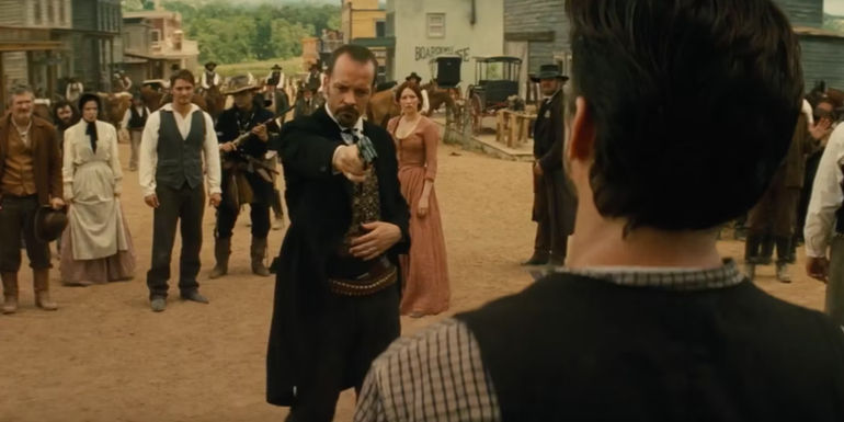 Bartholomew Bogue (Peter Sarsgaard) pointing a gun in The Magnificent Seven