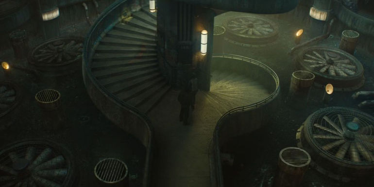 The staircase in Silo surrounded by fans