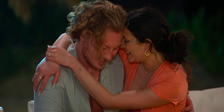 Love Is Blind Amy & Johnny embracing at couples' first get together