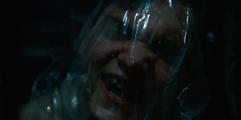 Suffocating person in History of Evil