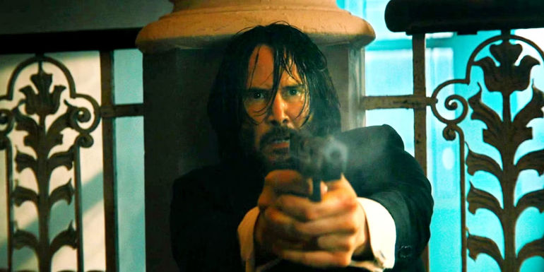 Keanu Reeves tựa vào một cột và nhắm súng trong John Wick: Chapter 4. - Cách Keanu Reeves Có Thể Trở Lại Cho John Wick 5