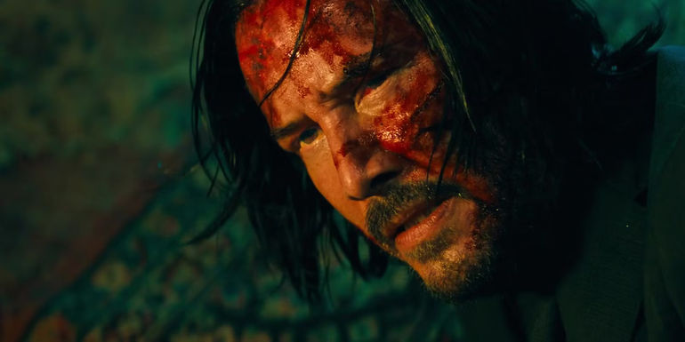 Keanu Reeves as John Wick at the end of John Wick Chapter 3 - The Curious Case of Previous Snubs
