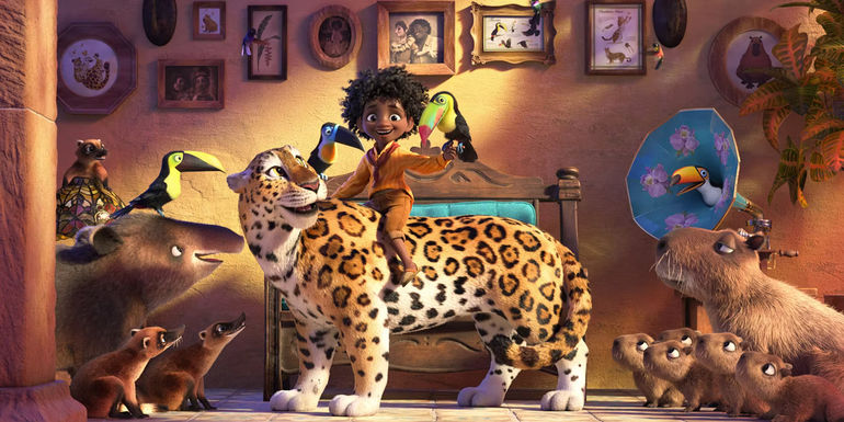 Antonio holds a bird as he rides a jaguar and is surrounded by other animals in Disney's Encanto. - Voiced by Ravi Cabot-Conyers - Antonio: Talks To Animals