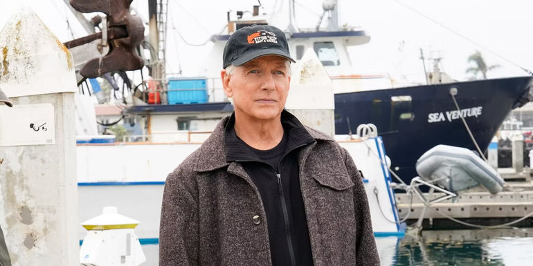 Gibbs wearing a baseball cap near the docks on NCIS  - NCIS season 21 has a couple of opportunities to feature Gibbs. - When Gibbs Might Return In NCIS?