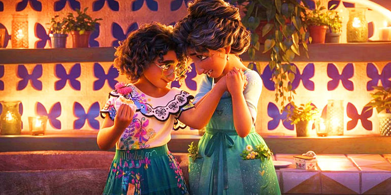 Julieta and Mirabel touch heads and hands in Disney's Encanto. - Voiced by Angie Cepeda - Julieta: Heals With Food