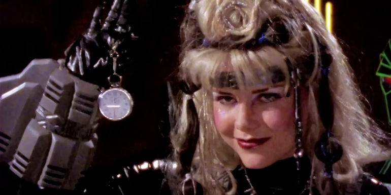 Power Rangers in Space's Astronema holding a watch - Princess of Evil/Pink Ranger - Karone/Astronema from Power Rangers In Space/Lost Galaxy