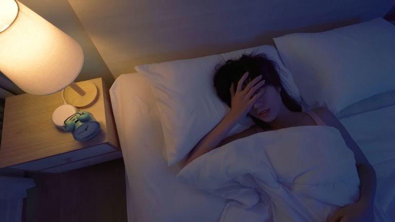 Struggling to Sleep Alone? Here's How to Overcome It