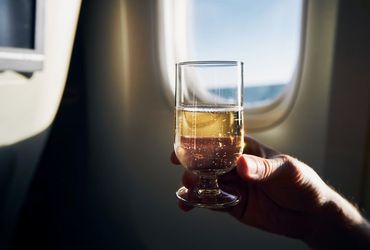 Avoid Alcohol Before Napping During Flights for Better Health and Sleep