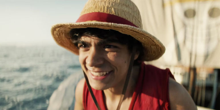 Iñaki Godoy as Luffy smiles while thinking of his dream to become king of the pirates in Netflix's One Piece