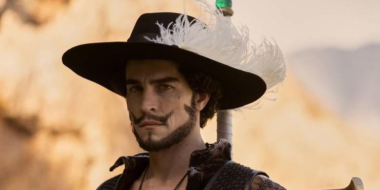 Steven John Ward as Mihawk stares at Red-Haired Shanks and his crew in Netflix's live-action One Piece