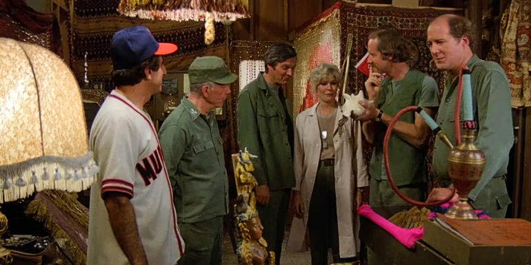 Jamie Farr's Klinger, Harry Morgan's Potter, Alan Alda's Hawkeye, Loretta Switt's Margaret, Mike Farrell's BJ, and David Ogden Stiers as Winchester in MASH season 8