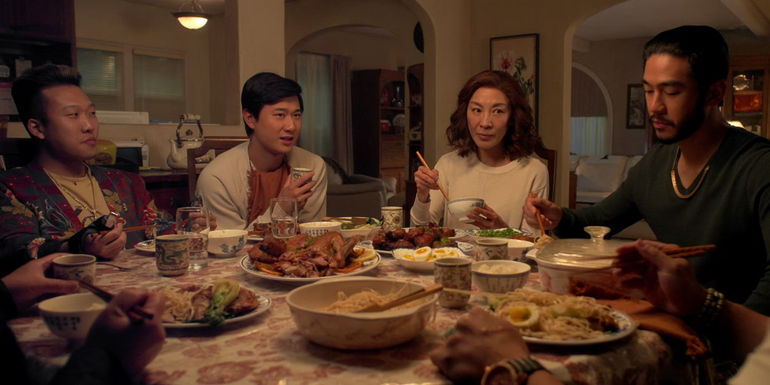 The Sun family gathers for dinner in The Brothers Sun