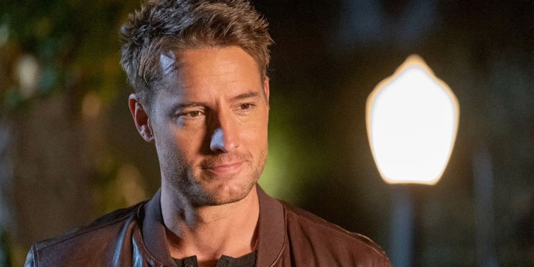 Up close shot of Justin Hartley standing in front of lightpost outside