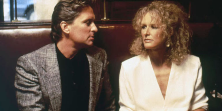 Dan (Michael Douglas) and Alex (Glenn Close) in a restaurat in Fatal attraction.