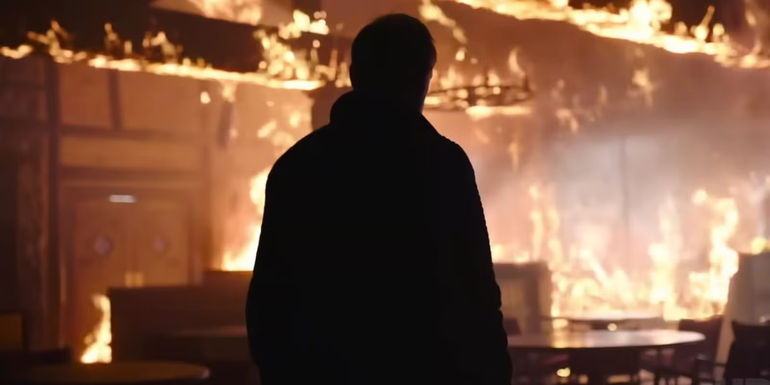 David in a burning steakhouse in The Last of Us