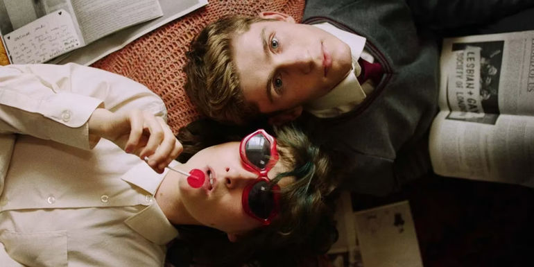 Eddie and Amber lying on the floor in Dating Amber 