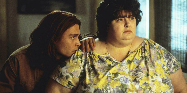 Gilbert (Johnny Depp) leaning on Bonnie (Darlene Cates) in What's Eating Gilbert Grape