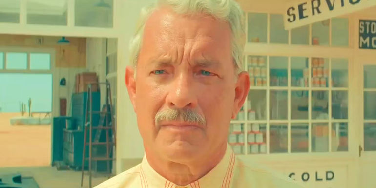 Tom Hanks outside a service station in Asteroid City