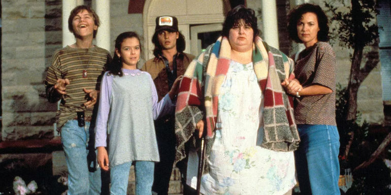 Bonnie (Darlene Cates), Arnie (Leonardo DiCaprio),Gilbert (Johnny Depp) standing outside their house in What's Eating Gilbert Grape