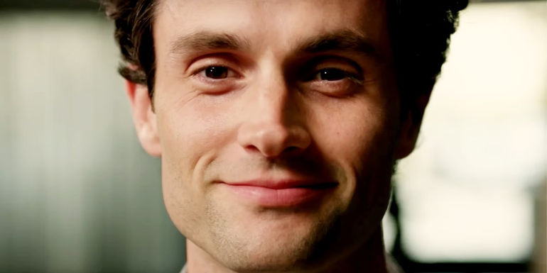 closeup of Joe Goldberg smiling on You