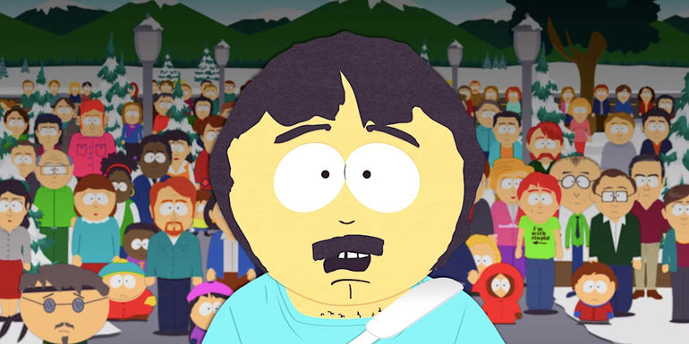 Randy standing and talking in front of South Park townspeople in South Park season 26