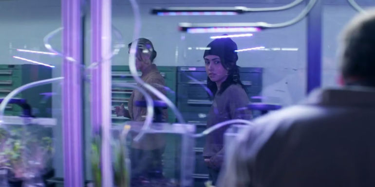 Lyla giving Hope a tour of research facility on Walking Dead World Beyond season 2