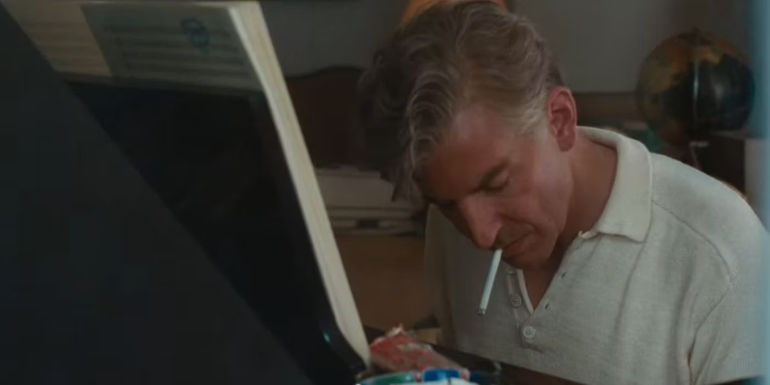 Bradley Cooper as Leonard Bernstein playing the piano in Maestro